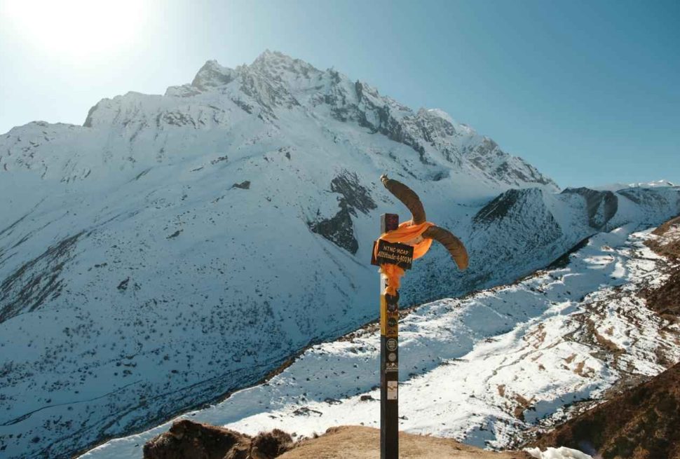 Manaslu Circuit Trek trail with snow covered Himalayan mountains near Larkya La Pass, Nepal